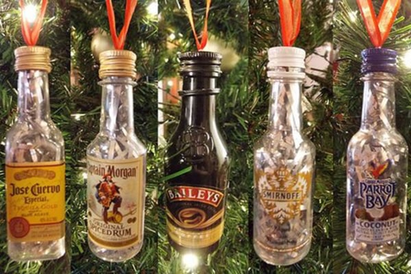 Miniture bottles hanging on a tree
